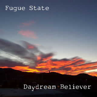 Photo of a orange-hued mountain sunrise, with the band name (Fugue State) printed in the upper left, and the album title (Daydream Believer) printed in the lower right. The font used for both of these resembles an old typewriter, and the words are in white.